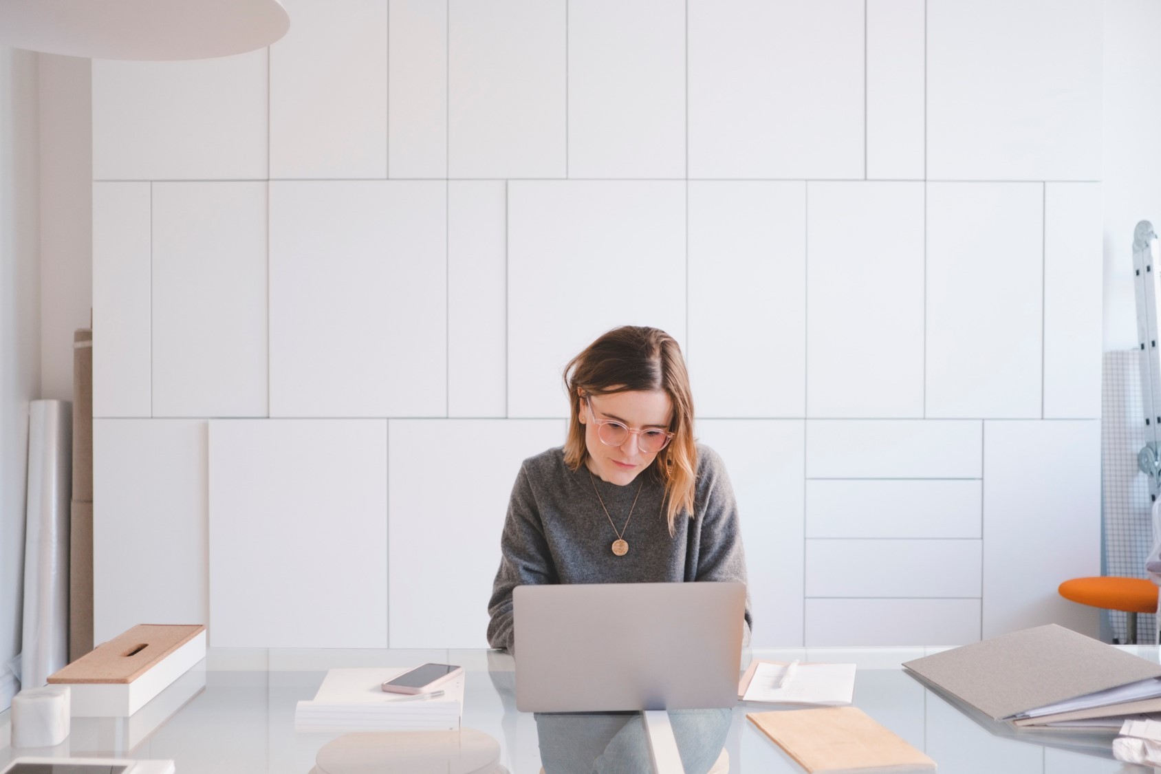 A woman uses her laptop for online banking services